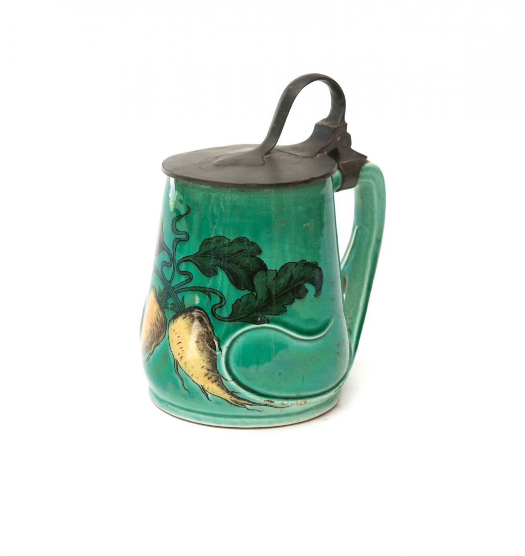 'Radish' beerstein, 1900: Richard Riemerschmid. 'Radish' beerstein, 1900. H. 16 cm. Made by Villeroy & Boch, Mettlach for Vereinigte Werkstaetten, Munich. Faience, polychromatic glaze, two radishes. Marked: Maker's mark, Dec.