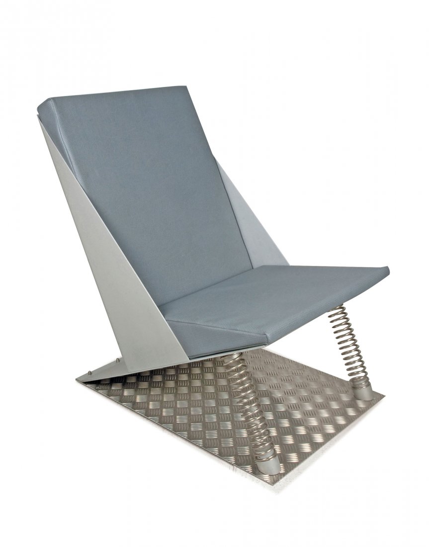 Unique lounge chair 'Schleudersitz', 1984/85: Hermann Waldenburg. 'Ejection seat', 1984/85. H. 91.5 x 60 x 86 cm. Made by Hermann Waldenburg, Augsburg. Sheet aluminium, part anodised, metal springs, grey synthetic leather.