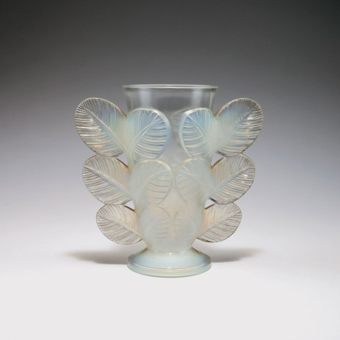 Vase with handles, c1930: Pierre D'Avesn, Croismare. Vase with handles, c1930. H. 16.8 cm. Clear and milk white moulded glass, slightly opalescent. Marked: P. D'AVESN, MADE IN FRANCE.