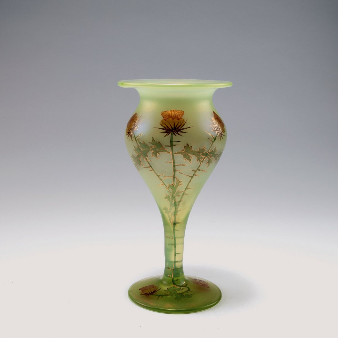 Goblet with thistles, c1900: Fritz Heckert, Petersdorf (attributed). Goblet with thistles, c1900. H. 24 cm. 'Cyprus' glass, pale green, polychromatic enamel with thistles, gold-hue.