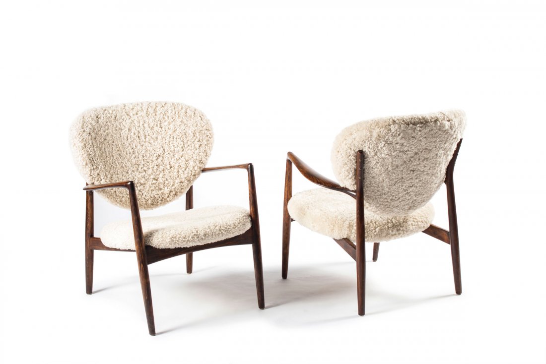 Pair of '190' armchairs, c1960: Arne Vodder. Two '190' armchairs, c1960. H. 84 x 71.5 x 74 cm. Made by Slagelse MËbelvaerk, Denmark. Beech, stained, sheepskin. Marked: Maker's stamp.
