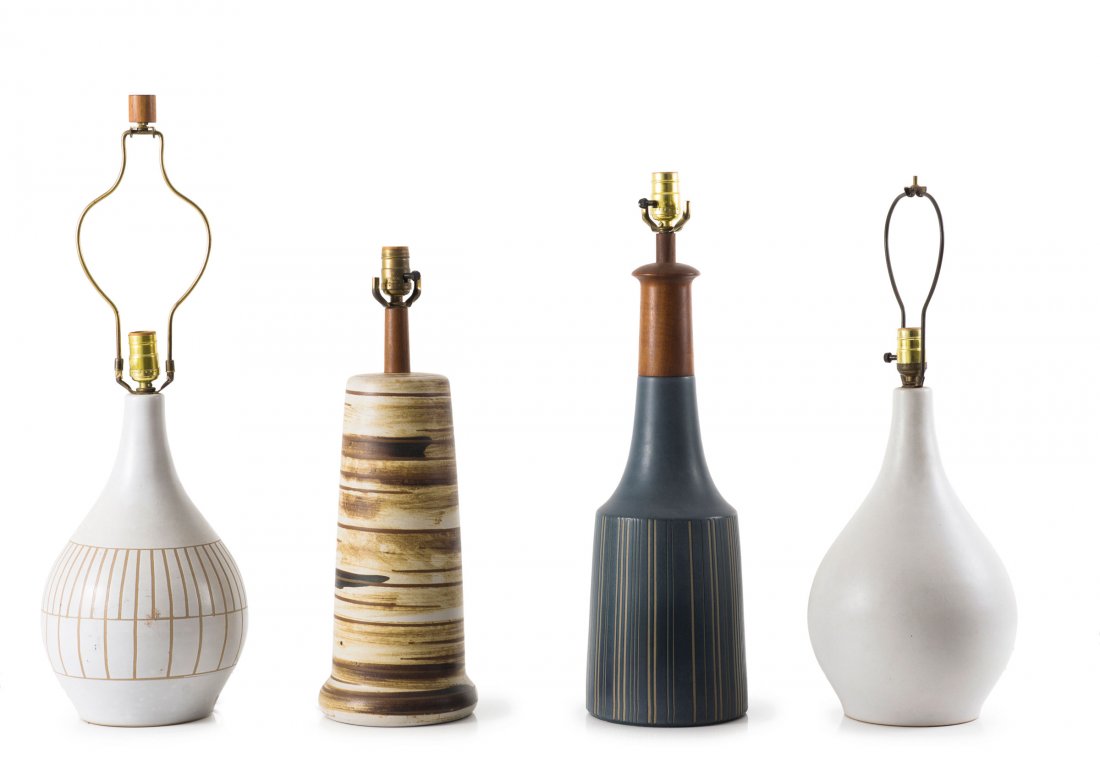 Four table lights, 1950s: Jane & Gordon Martz. Four table lights, 1950s. H. 54.5-71 cm. Made by Marshall Studios, Veedersburg, Indiana. Earthenware, glazed white, blue and brown, teakwood, brass. Signed. Labels of the Underwri