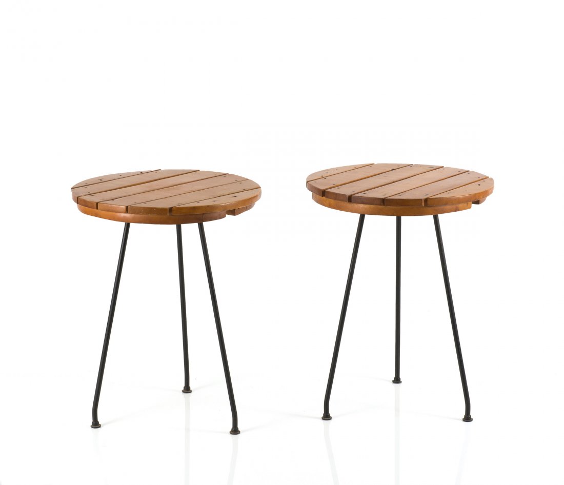 Pair of side tables, 1950s: Arthur Umanoff. Two side tables, 1950s. H. 57 cm, D. 45.5 cm. Made by Raymor, New York. Fruit wood, steelrods, painted black.