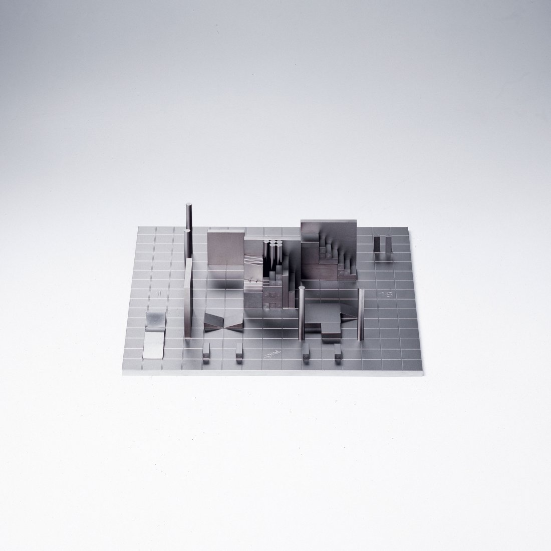 'Architecturtaile', 1999: Heinz Witthoeft. 'Architekturtaile', 1999. 2 pieces. Birch, stained dark, matted stainless steel. 36.2 x 36.1 cm (plate), 48.0 x 48.0 cm (plate and wooden frame), H. 3.1-6.0 cm. Signed: Heinz Witthoef