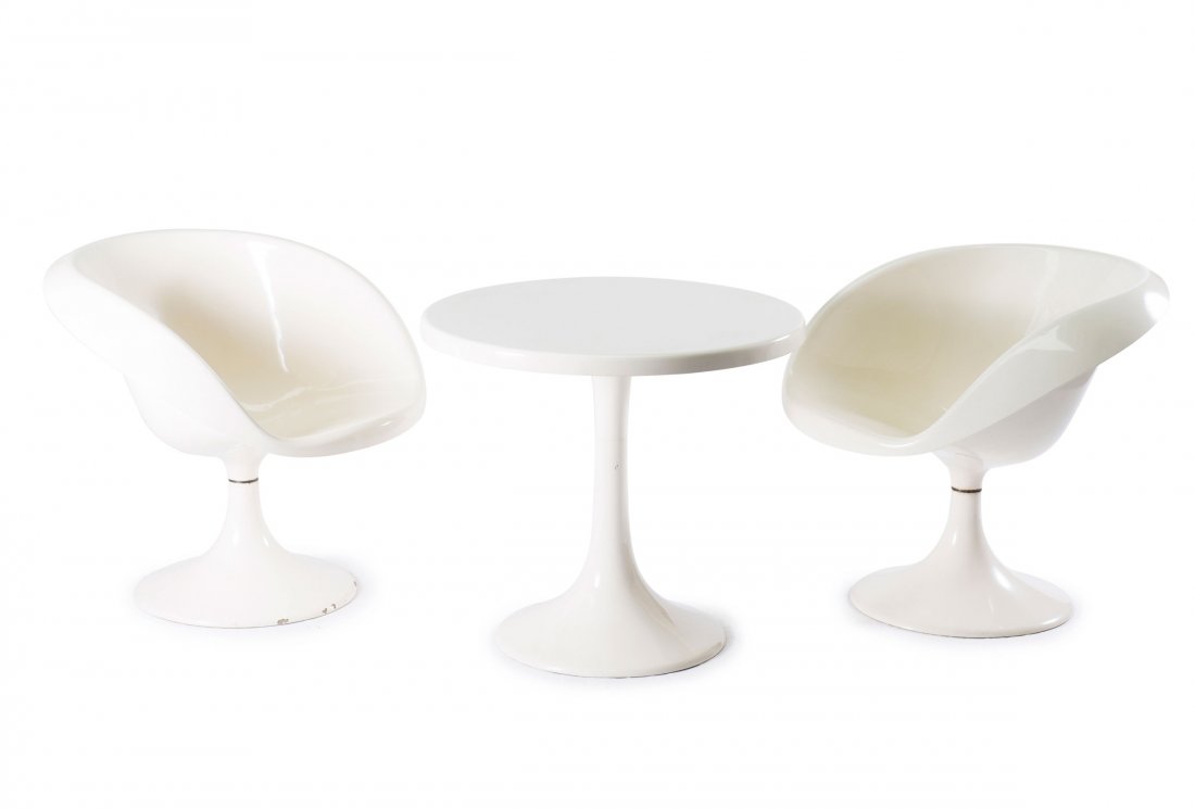 Two chairs and table, 1960s: Iparmuveszeti Vallalat, Hungary. Two easy chairs and a table, 1960s. Table: H. 65 cm, D. 72.5 cm; easy chairs: H. 70 x 77 x 71 cm. White plastic, reinforced with Fiberglas. Marked: Remains of a maker'