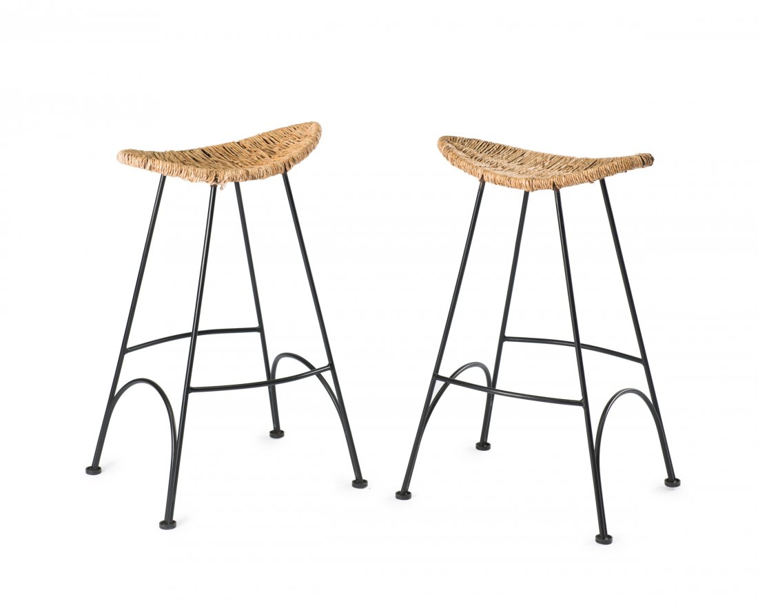 Two 'Banana' barstools, 1988: Tom Dixon. Two 'Banana' bar stools, 1988. H. 80 x 52 x 43 cm. Made by Cappellini, Milan. Metal rods, lacquered black, reedwork.