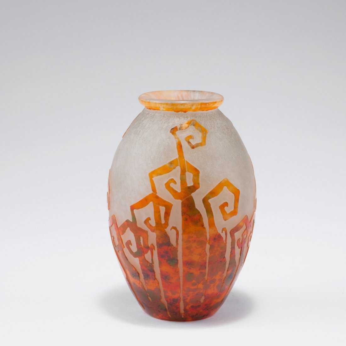 'Fougeres' vase, 1927-28: Schneider, Epinay-sur-Seine. 'Fougeres' vase, 1927-28. H. 17.4 cm. Cased glass, clear, white powder inclusions, orange, red and green enamel fusions. Multiply etched fern pattern. Signed: Charder, Le