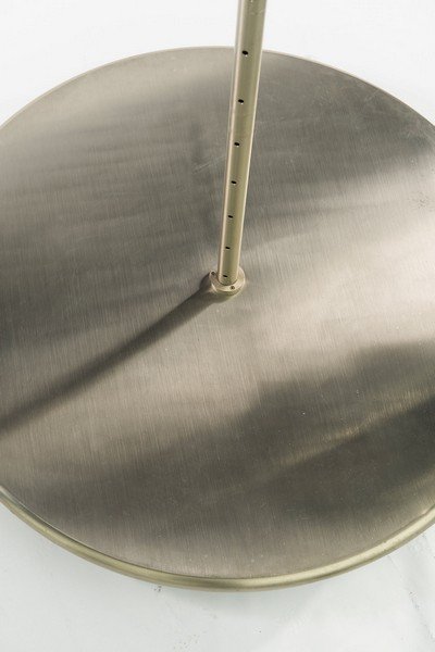 Display shelf, 1992: Marc Newson. Display shelf with hoop, 1992. H. 214 cm, D. 120 cm. Made by Cappellini, Milan. Chrome-plated tubular steel, sheet aluminium.