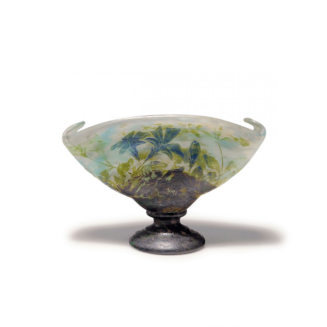 'Pervenche' goblet, 1905-10: Daum Freres, Nancy. 'Pervenche' goblet, 1905-10. H. 16.5 cm. Cased glass, clear, lemon yellow and pale blue powder inclusions, green and brown enamel fusions, partial blue applications, worked with th