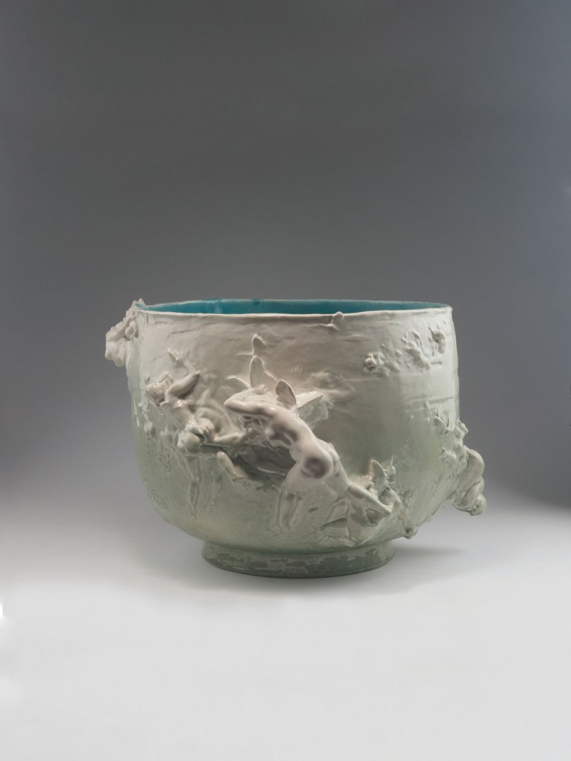 Large flowerpot 'Poursuivies par les papillons', 1892: Joseph Cheret. Large flowerpot 'Poursuivies par les papillons', 1892. H. 34.5 cm, D. 43 cm. Made by Theodore Deck, Sevres. Earthenware, glazed white and matt green, inside blue. Textured pattern with