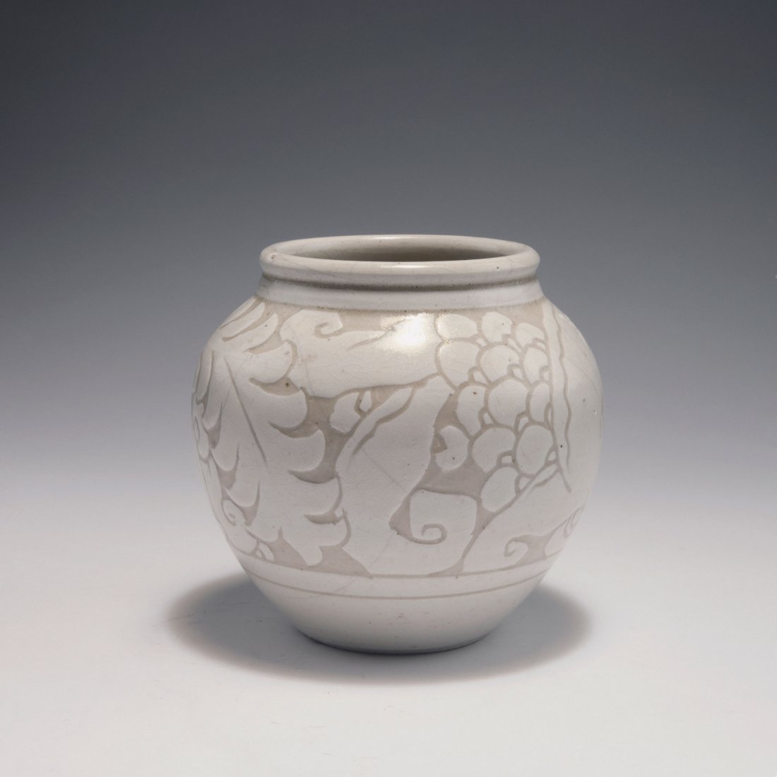 Vase, c1925: Emile Lenoble, Choisy-le-Roi. Vase, c1925. H. 13.6 cm. Stoneware, textured flower pattern, glazed creme-white and grey. Signed: LE, 217.