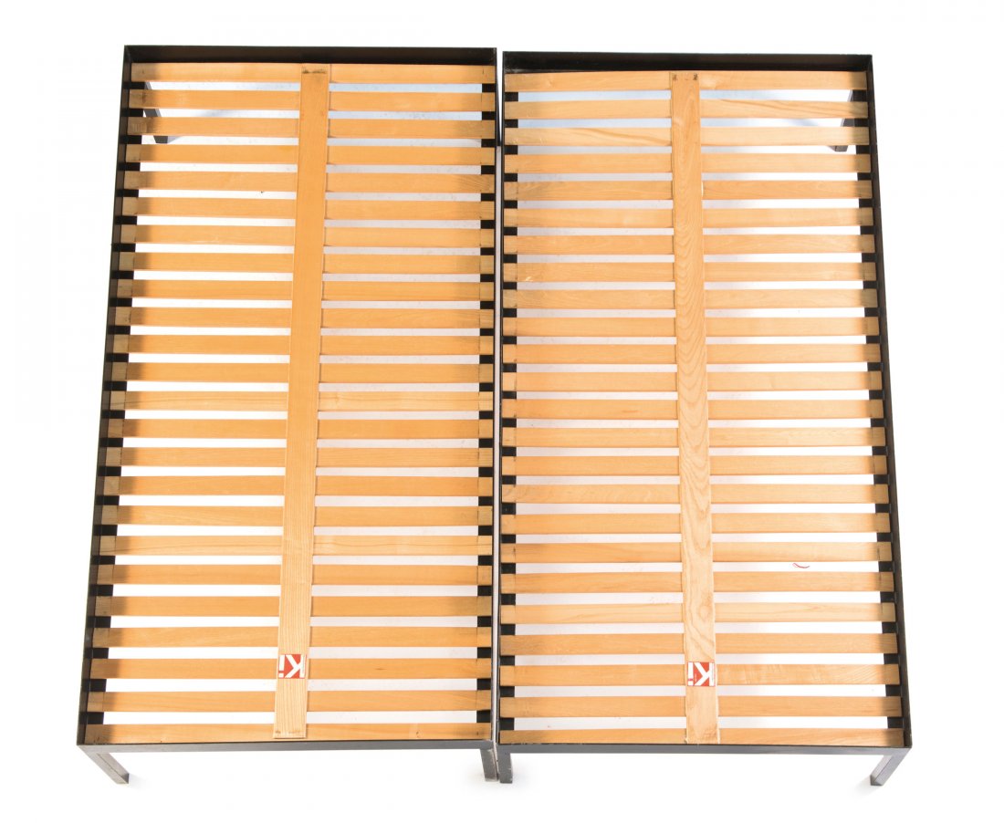 Two 'GB 1085' daybeds, 1955: Hans Gugelot. Two 'GB 1085' daybeds, 1955. H. 3.5 x 90.5 x 191 cm. Hochschule fuer Gestaltung (hfg), Ulm. Steel, painted black, elmwood.