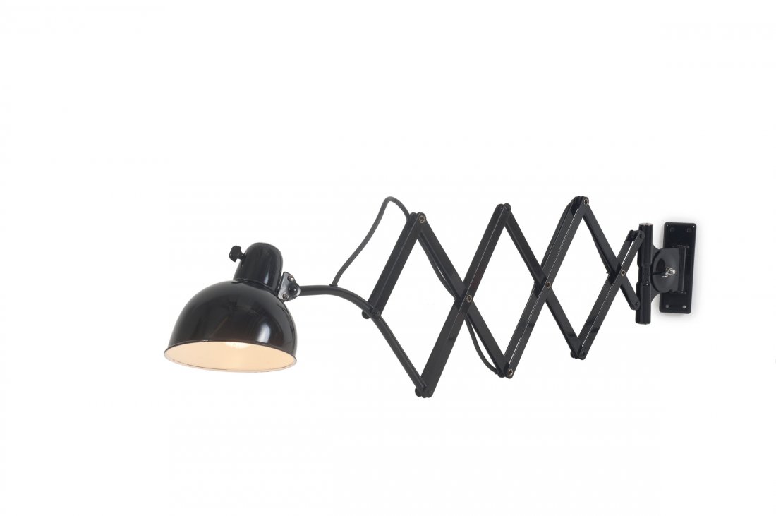 Extensible wall light, c1930: Christian Dell. Extensible wall light, c1930. L. 122 cm, D. 16 cm. Made by Kaiser & Co., Neheim-Huesten. Tubular metal, sheet metal, painted black. Marked: ORIGINAL KAISER idell.