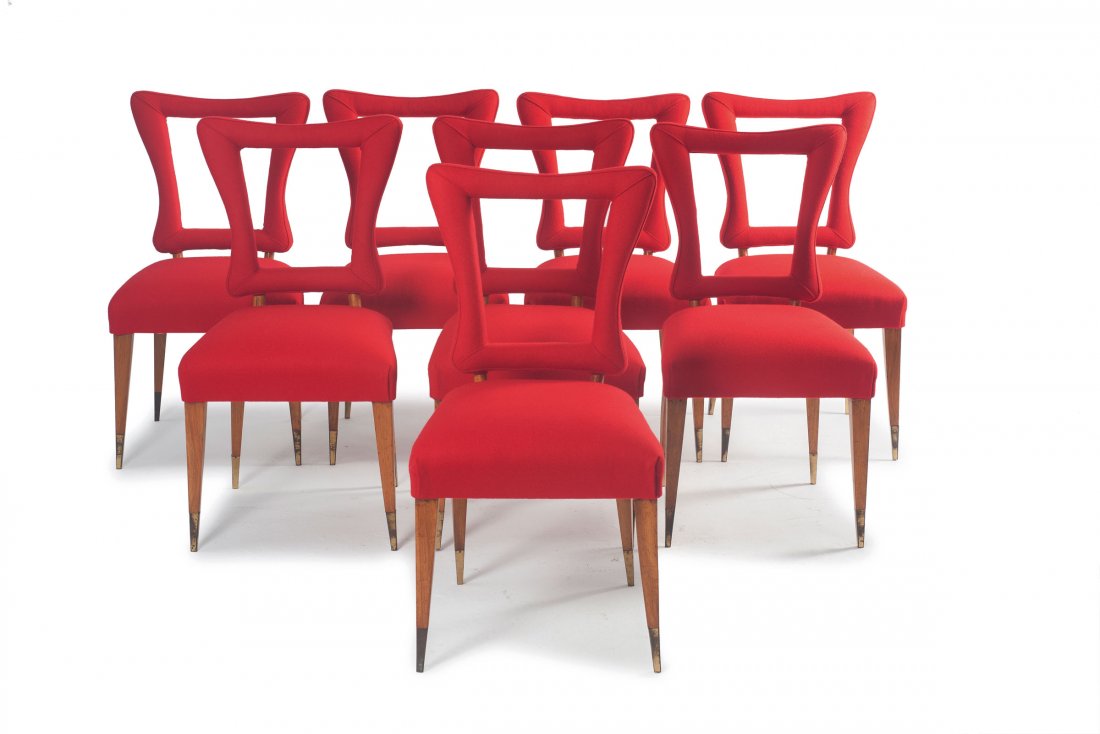 Table and eight chairs, c1950: Italy. Table and eight chairs, c1950. table: H. 76 x 201 x 101 cm; chairs: H. 88.5 x 48 x 53 cm. Nutwood, glass, red fabric, brass feet.