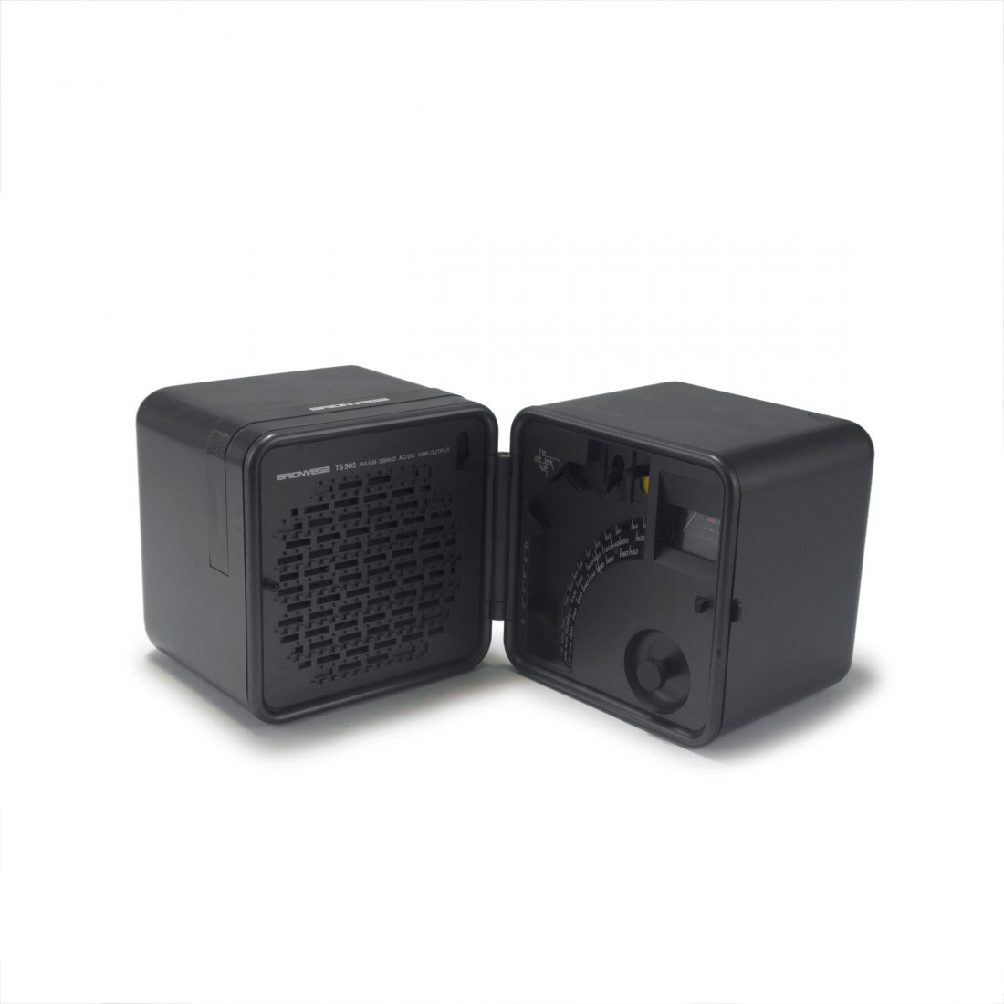 'TS 505 a' radio, 1977: Richard Sapper; Marco Zanuso. 'TS 505 a' radio, 1977. H. 13 x 22.5-26 x 11 cm. Made by Brionvega, Milan. Anthracite grey plastic. Marked: BRIONVEGA TS 505 a, BRIONVEGA PATENTED MODEL MADE IN ITALY FAB