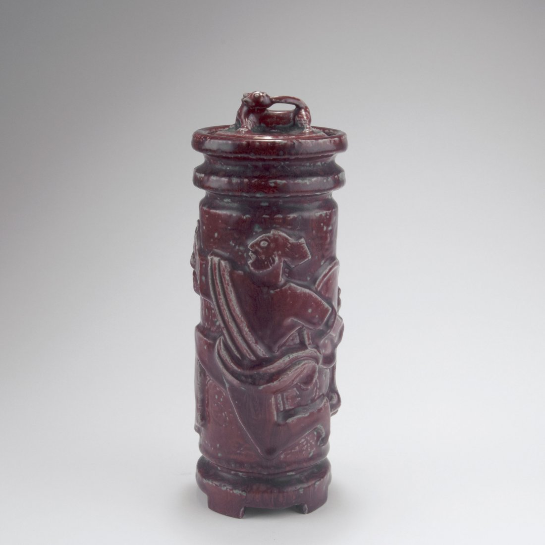 Vase with cover, 1923-29: Jais Nielsen. Vase with cover, 1923-29. H. 26.8 cm. Made by Royal Copenhagen, 1963. Stonware, textured pattern. Oxblood glaze. Lid and bottom marked: JAIS, waves, 20100, ROYAL COPENHAGEN DENMARK.