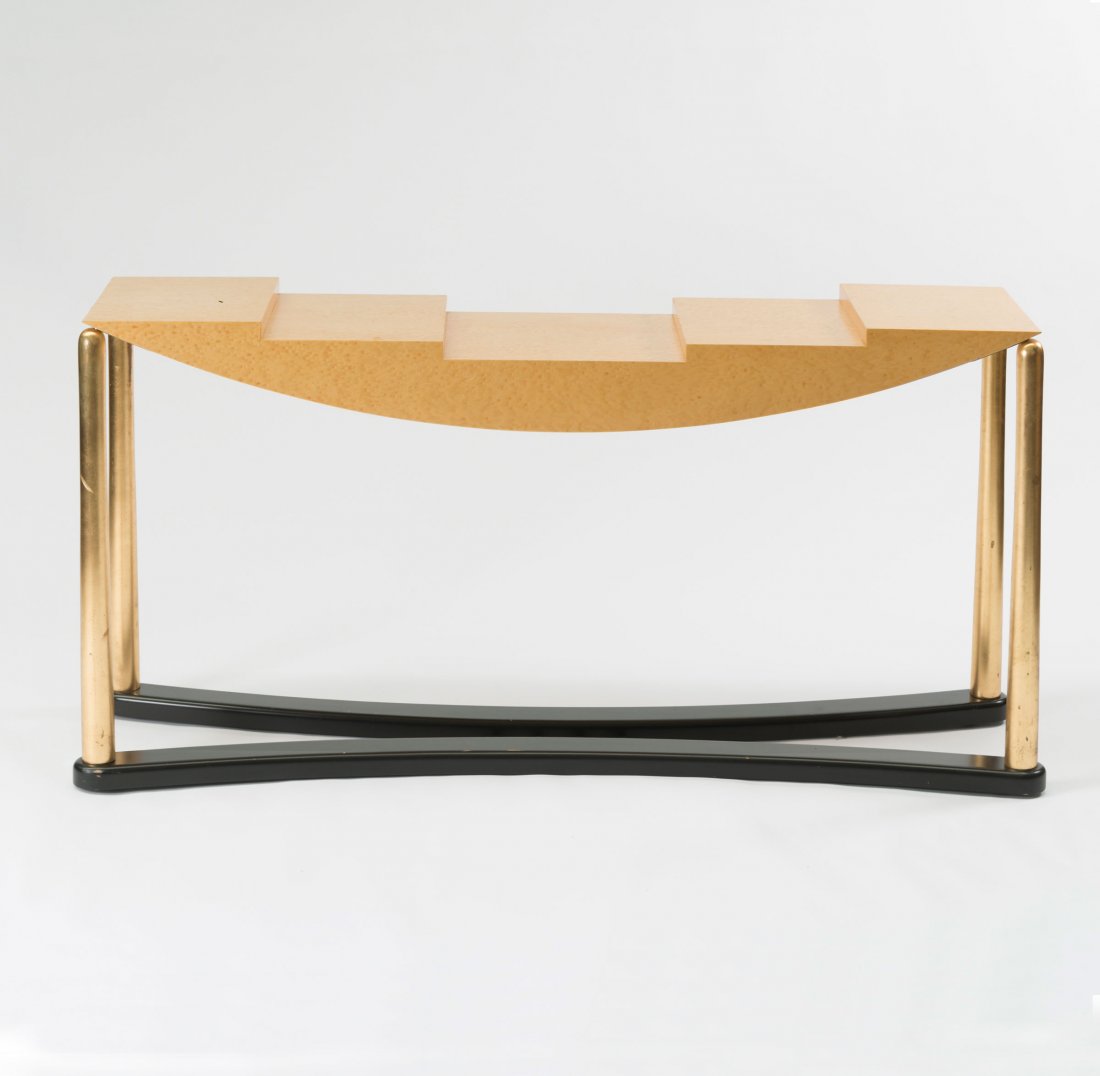 'Schwarzenberg' console table, 1981: Hans Hollein. 'Schwarzenberg' console table, 1981. H. 81.5 x 162 x 42 cm. Memphis, Milan. Wood, painted black, gilded, bird's eye maple veneer. Marked: MEMPHIS Milano. Hans Hollein, 1981. Made in Ital
