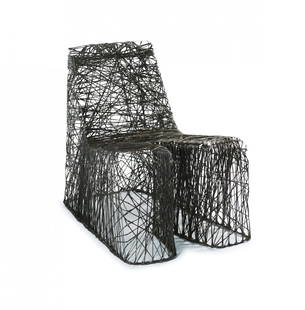 'Sexy Relaxy' easy chair, 2005: Richard Hutten. 'Sexy Relaxy' easy chair, 2005. H. 75 x 60.5 x 76.5 cm. Made by Richard Hutten Collection, The Netherlands. Carbon fibres, black.