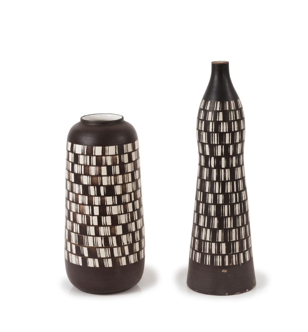 Two vases, c1960: Aldo Londi. Two vases, c1960. H. 40.5-53 cm. Made by Bitossi, Montelupo for Raymor, New York. Faience, glazed dark brown on creme-white. Inscribed: 229/39 ITALY resp. 236 ITALY 44(...), distributor's
