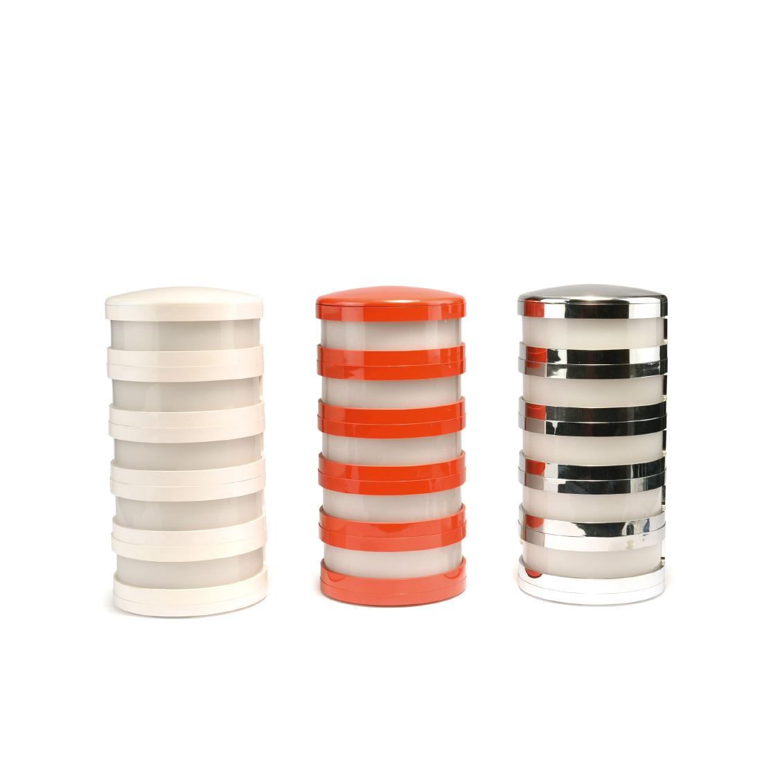 Three 'Dracma' table lights, 1960s: Ambrogio Brusa. Three 'Dracma' table lights, 1960s. H. 33 cm, D. 16 cm. Made by Bilumen, Milan. White Perspex, plastic, white and orange red and chromed. Marked: BILUMEN art1040 design AmbrogioBrusa m