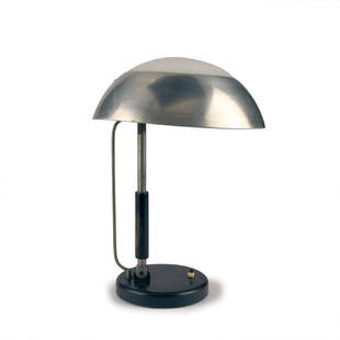 Table light, c1930: Karl Trabert. Table light, c1930. H. 45 cm, D. 33 cm. Made by Schanzenbach & Co., Frankfurt. Cast iron, sheet metal, painted black, tubular aluminium, sheet aluminium, wood, painted black, white glass