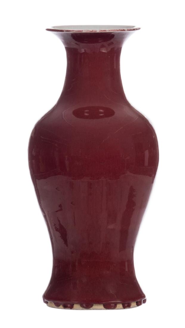 A Chinese sang-de-boeuf baluster vase, H 39 cm: A Chinese sang-de-boeuf baluster vase, H 39 cm