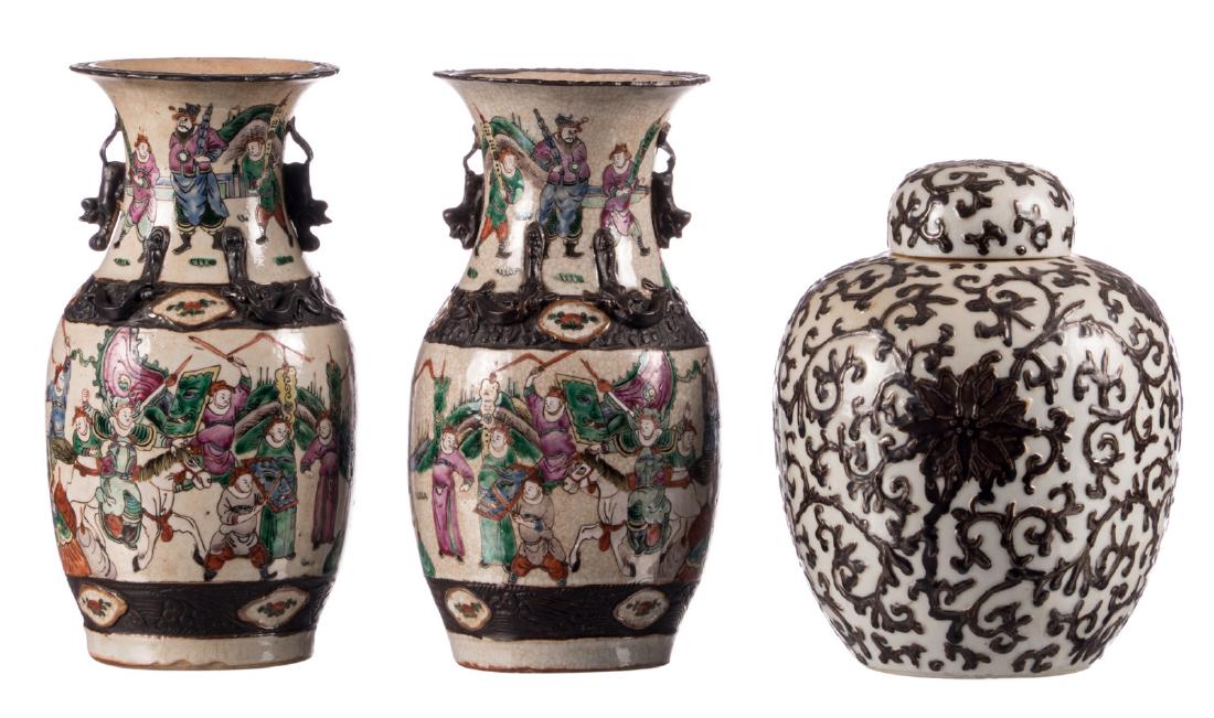 A pair of Chinese stoneware polychrome vases, decorated (1 of 11)