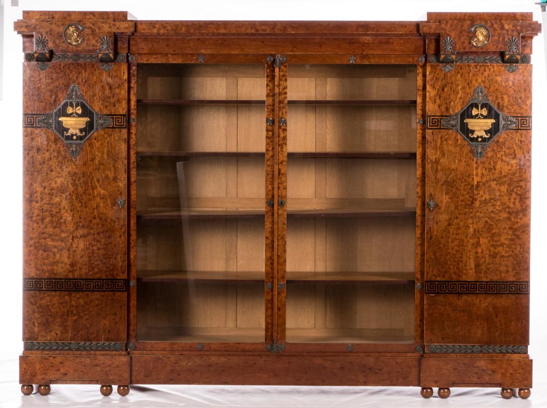A walnut and burr veneered neoclassical bureau: A walnut and burr veneered neoclassical bureau furniture set, bronze mounts, in the De Coene - Courtrai manner, bureau H 76 - B 140 - D 73 cm / bookcase H 114 - B 255 - D 46,5 cm