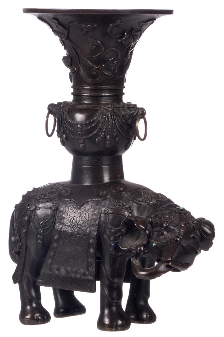 A Chinese bronze elephant shaped incense burner with: A Chinese bronze elephant shaped incense burner with semi-precious stones, H 31 cm