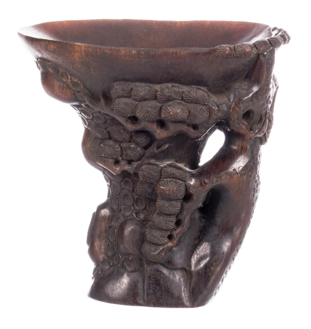A Chinese carved horn libation cup, 19thC, H 14 cm (1 of 9)