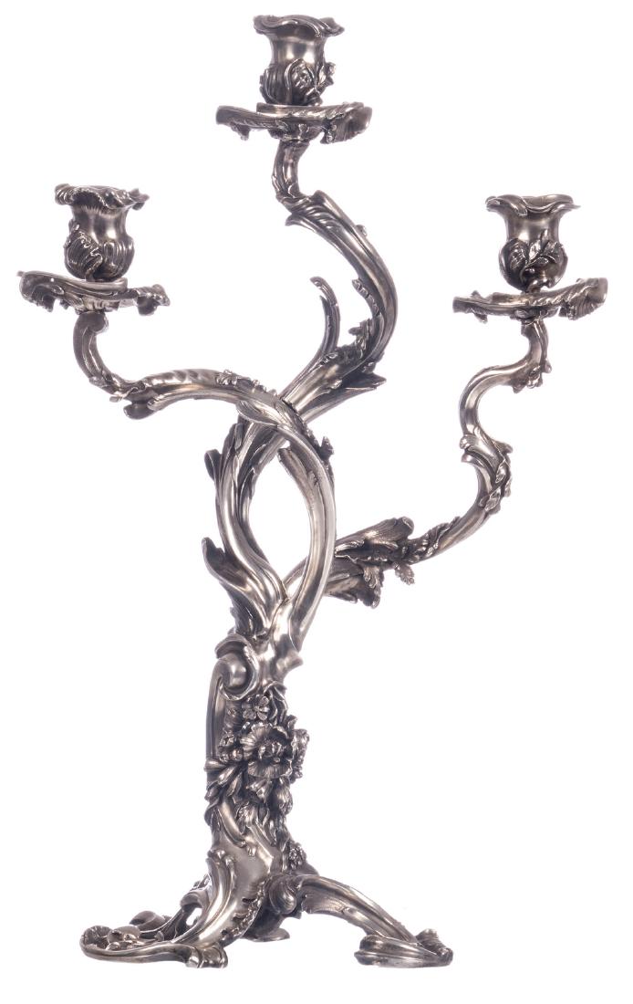 A Rococo style French export silver candelabra, silver: A Rococo style French export silver candelabra, silver purity 950/000, makers' mark 'Alphonse Debain', H 47 cm - Weight: 2990g