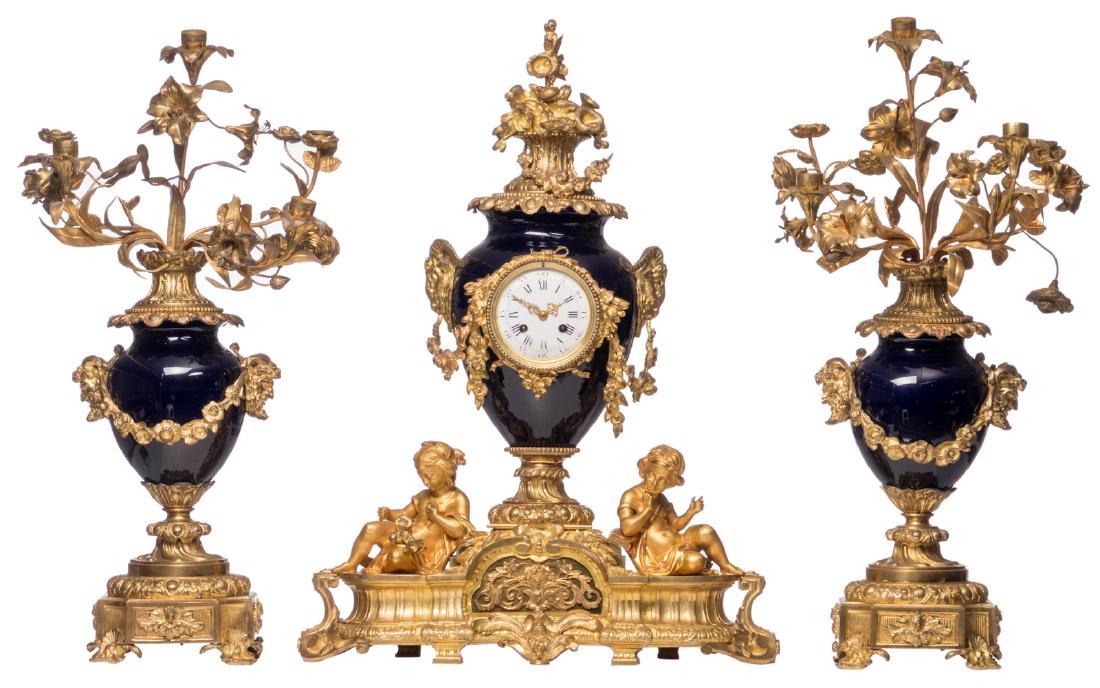 A late 19thC bleu royal three-piece garniture, gilt (1 of 9)