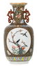 A Chinese famille rose floral decorated vase, the