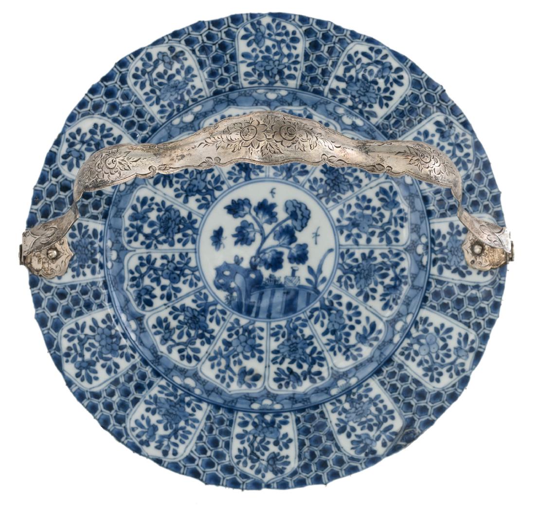 A Chinese blue and white floral decorated accolade (1 of 6)