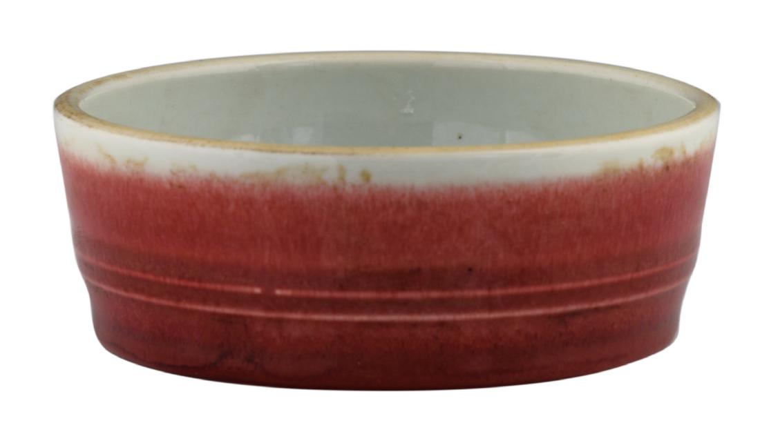 A Chinese peach blossom brush washer, with a Qianlong: A Chinese peach blossom brush washer, with a Qianlong mark, H 5 - ∅ 13,5 cm