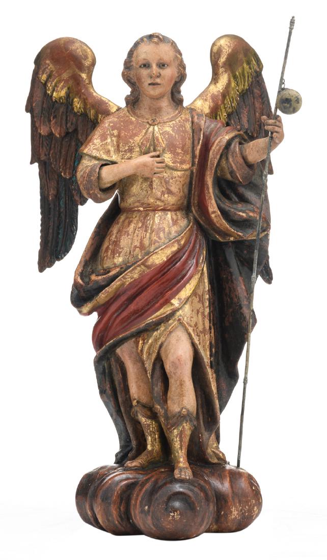 A probably 18thC Southern German polychrome painted and: A probably 18thC Southern German polychrome painted and gilt limewood sculpture depicting an archangel, H 44,5 cm