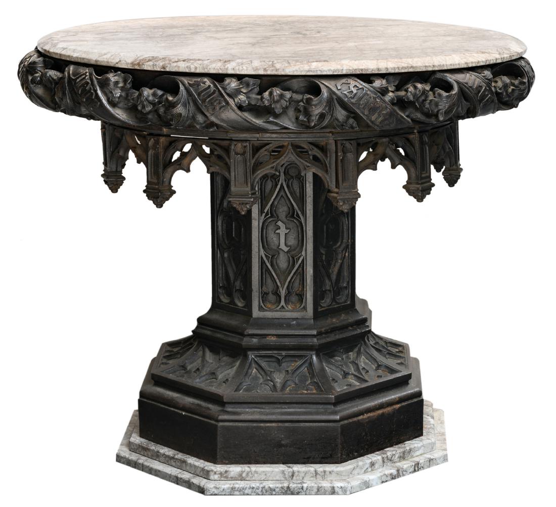 An octagonal Gothic revival table de milieu with cast: An octagonal Gothic revival table de milieu with cast iron base and marble top, about 1890 - 1910, H 71 - ø 84 cm