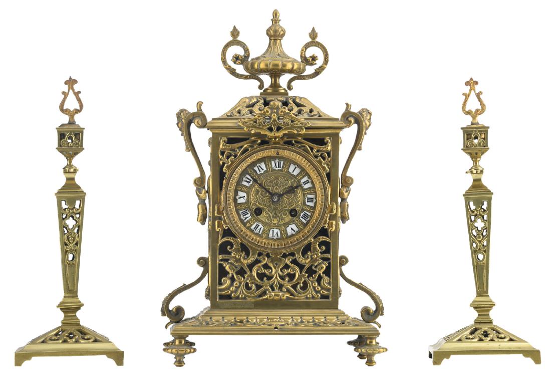 A first quarter of the 20thC three-piece bronze: A first quarter of the 20thC three-piece bronze Renaissance revival garniture, H 30 - 38 cm