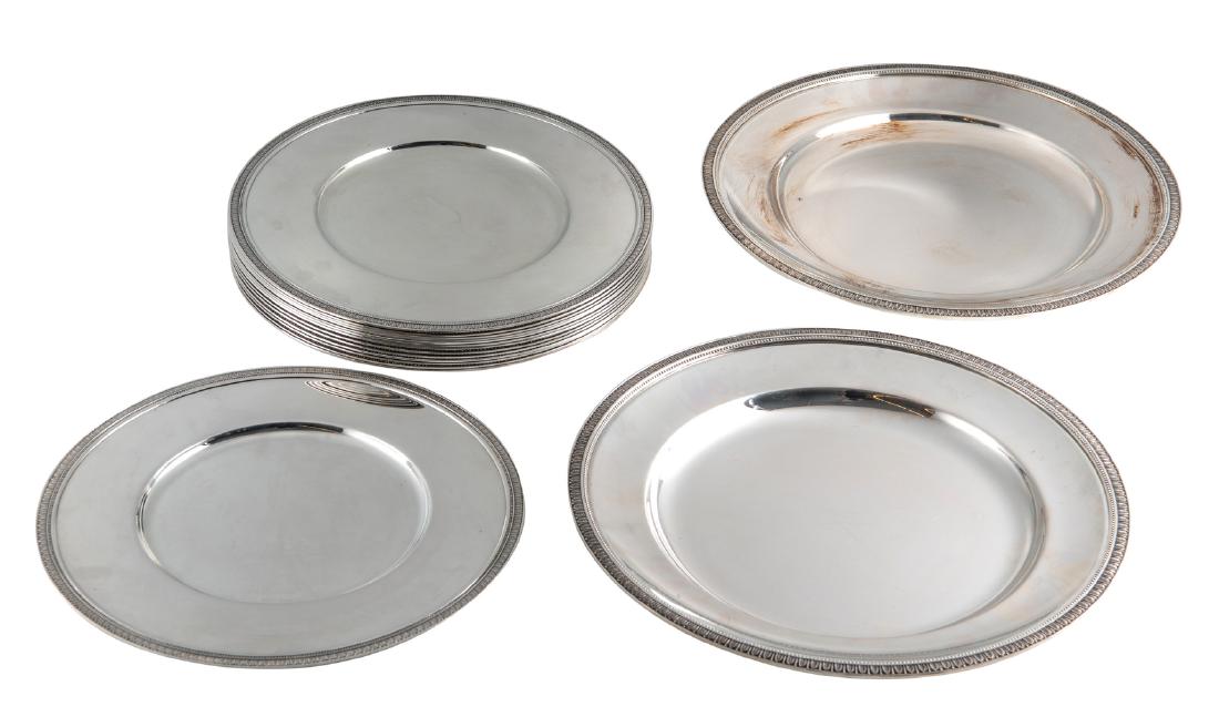 A collection of two silver plated trays and 14: A collection of two silver plated trays and 14 Neoclassical silver plated underplates, Malmaison, Christofle - France,Â Ã¸ 30 - 35 cm