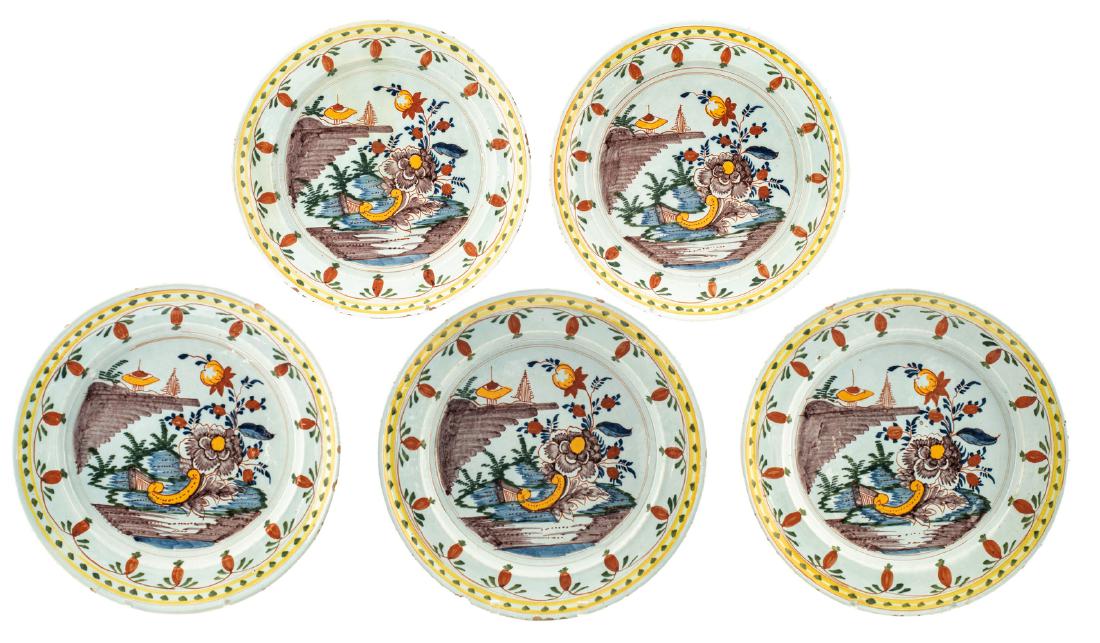 Five 18thC polychrome decorated earthenware plates,: Five 18thC polychrome decorated earthenware plates, probably northern France, Ã¸ 34 cm