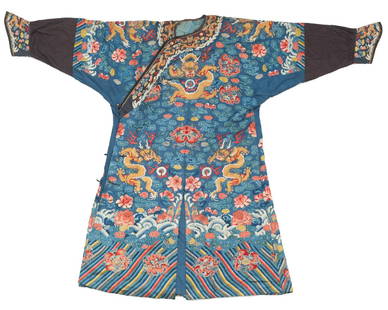 A Chinese embroidered blue ground silk and gold thread: A Chinese embroidered blue ground silk and gold thread robe, decorated with dragons chasing the flaming pearl amongst clouds, Qing dynasty, H 140 - W 184 cm