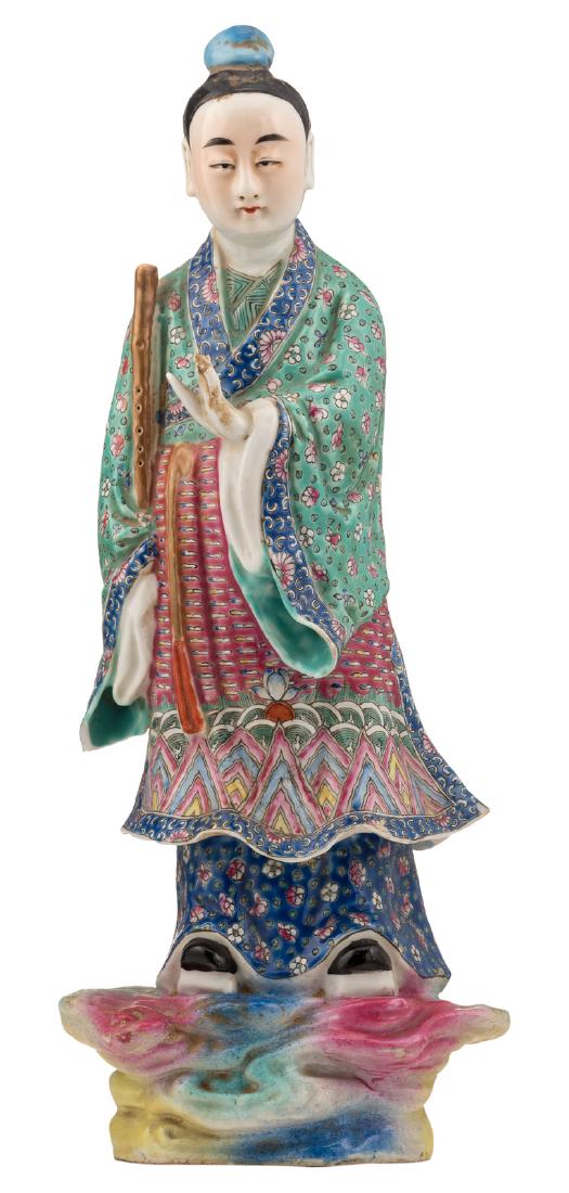 A Chinese polychrome figure, depicting the Immortal Han: A Chinese polychrome figure, depicting the Immortal Han Xiangzi, Qing dynasty, about 1900, H 33 cm