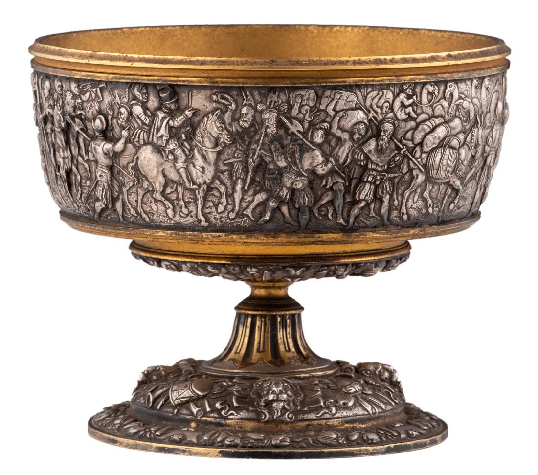 A Christofle silver and gilt silver bowl, the: A Christofle silver and gilt silver bowl, the renaissance inspired frieze depicting the battle for the true religion ..., serialnr 382840, H 13 - Ã˜ 15,5 cm, total weight about 1100 g