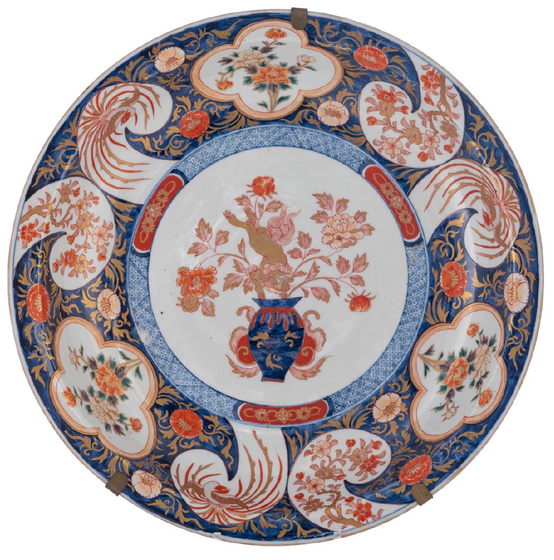 A large Japanese Arita Imari plate, decorated in the (1 of 3)