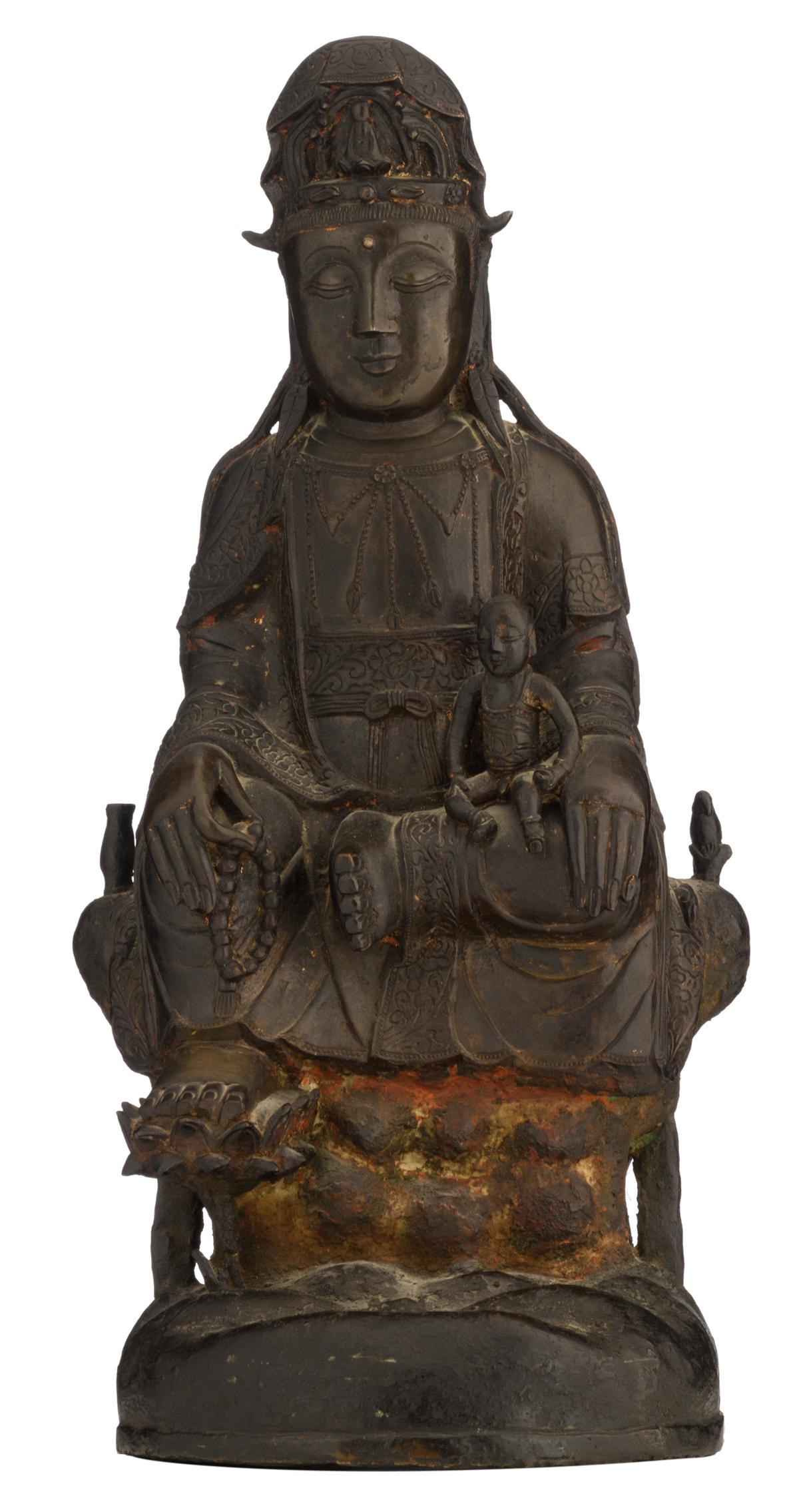A bronze seated Guanyin on a lotus, holding a boy, H (1 of 6)