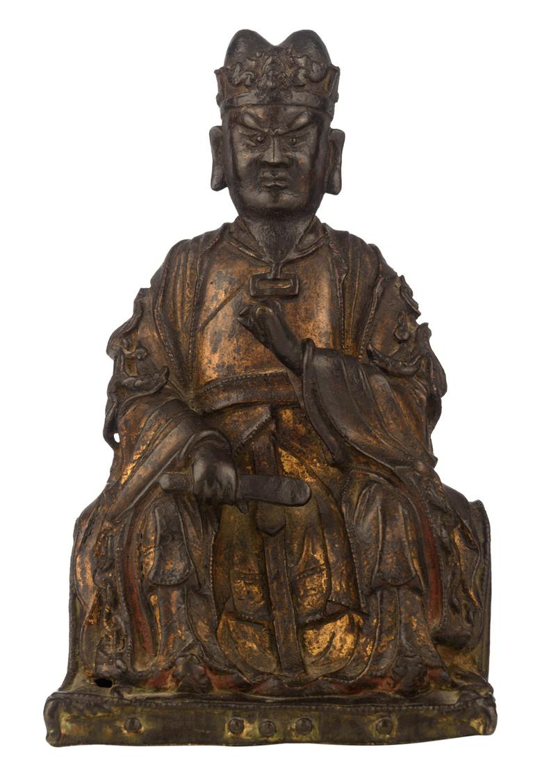A Chinese patinated bronze figure depicting a seated (1 of 6)