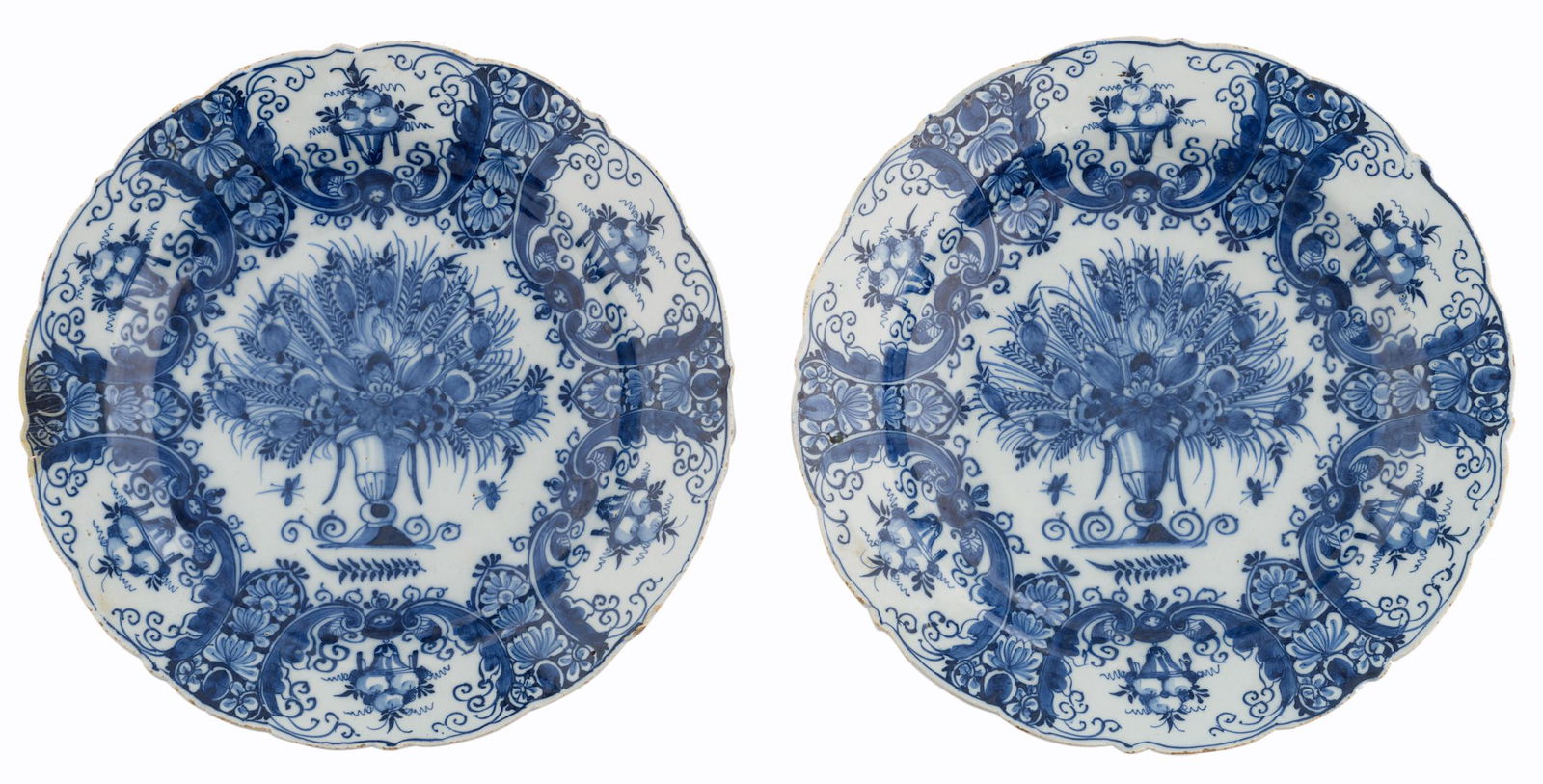 Two fine Delftware plates with a fluted rim, decorated (1 of 4)