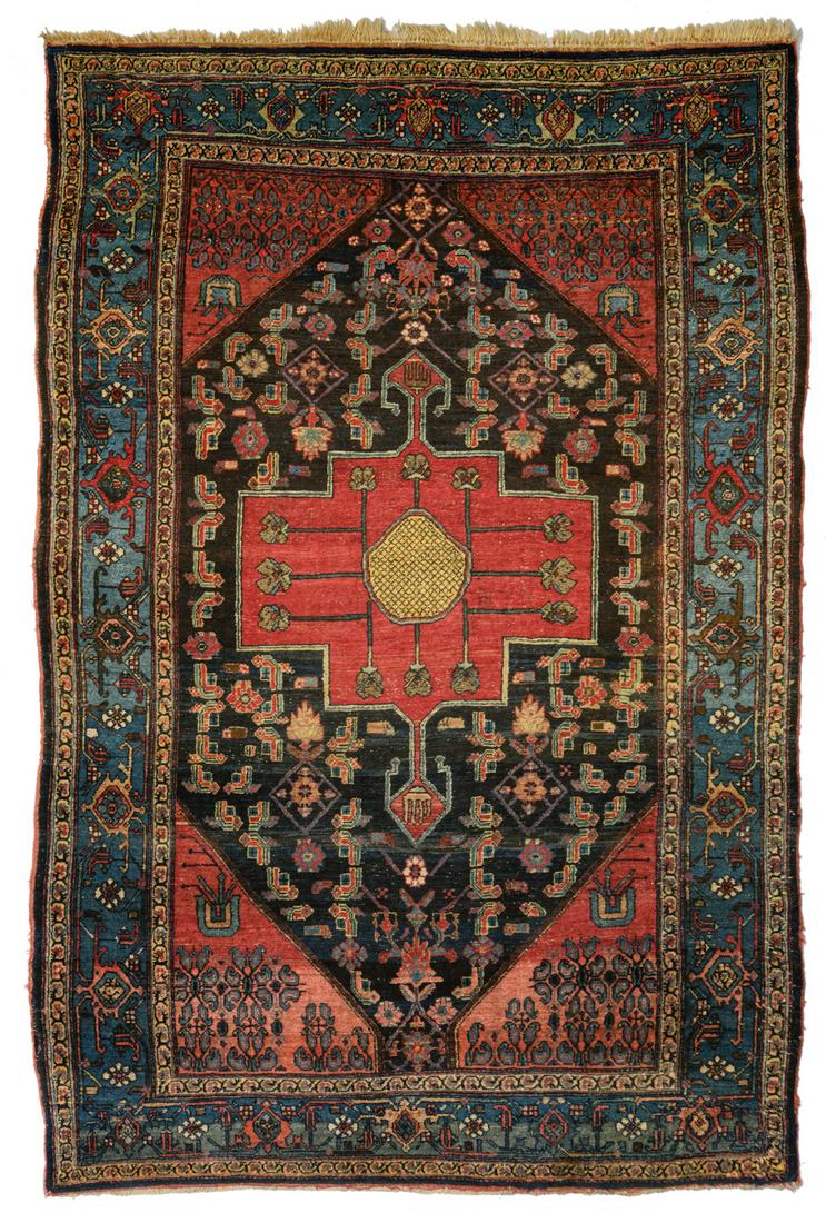 An Oriental woollen rug, decorated with stylised (1 of 3)