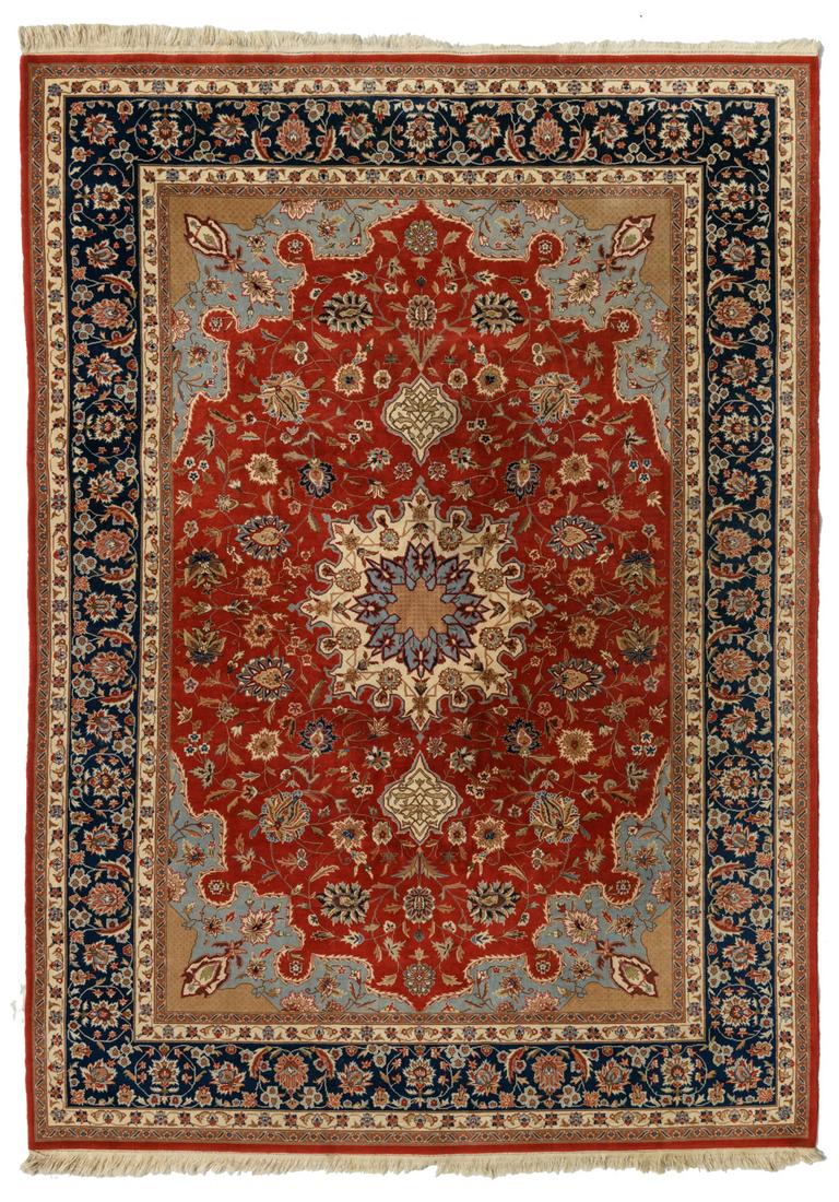 An Oriental woollen rug, floral decorated, with a (1 of 3)