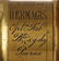 A mahogany folding camera, the lens marked 'Hermagis, - 8